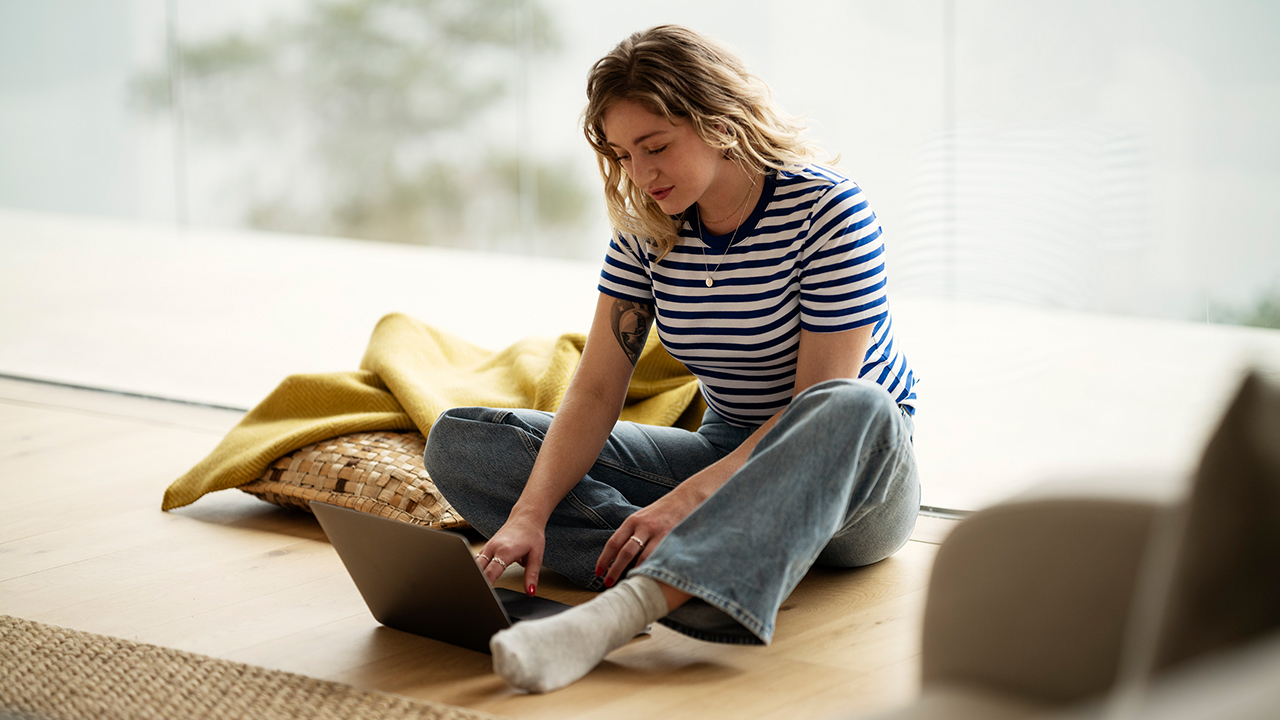 young woman sitting with laptop.jpg