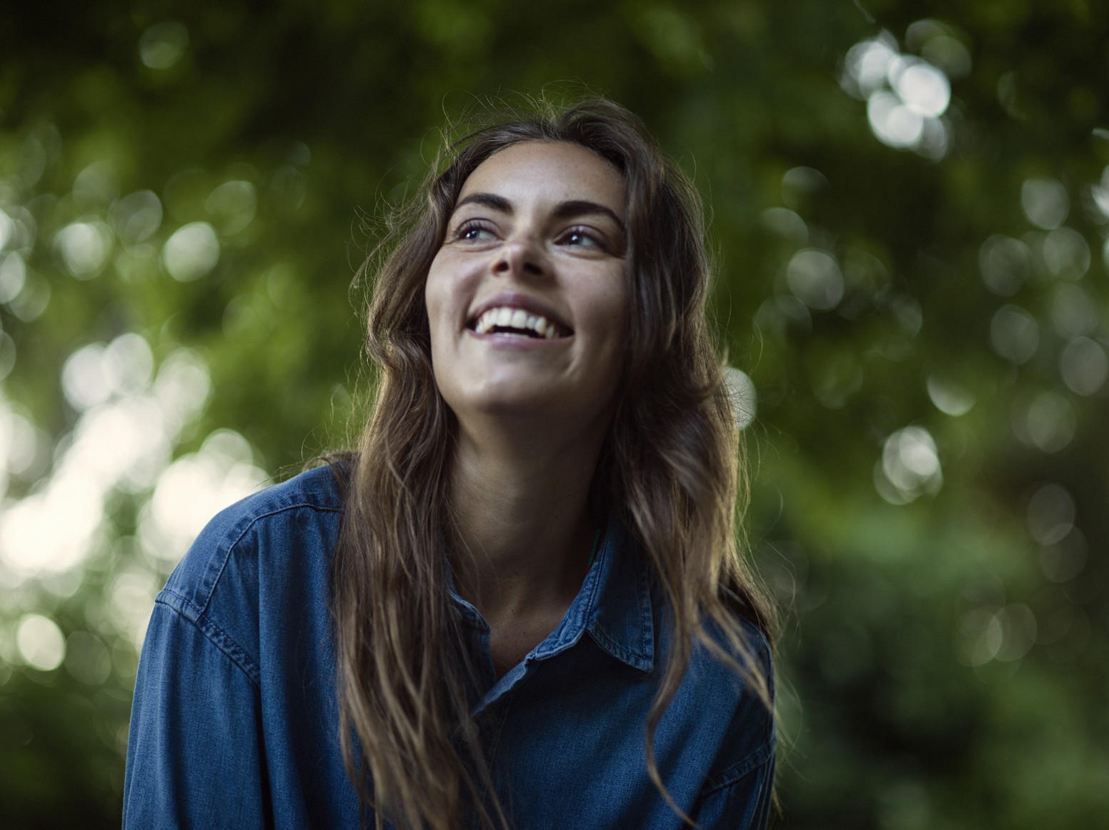 Woman smiling in nature cms